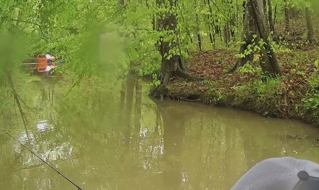 A truck (upper left) drives through my fishing spot, CCKF Tournament, lake Mackintosh, April 2023.